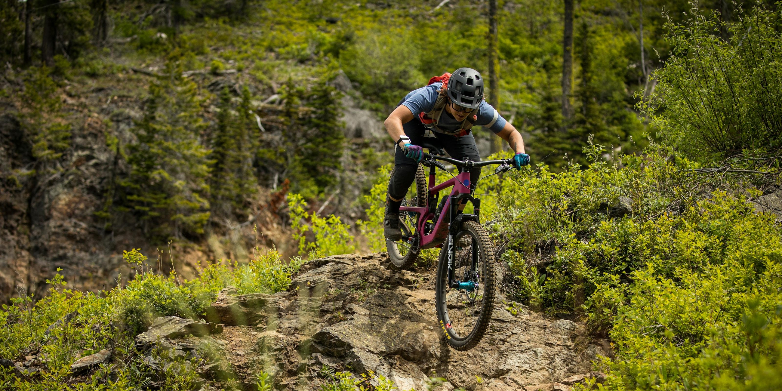 Juliana Bicycles Athlete Alex Pavon riding her Juliana Roubion down a rock face